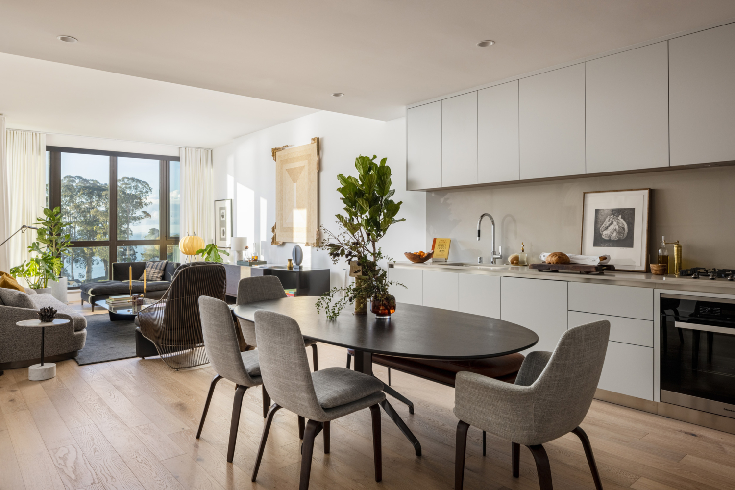 Modern living room and dining interior in Luxury Condominium Residences Yerba Buena Island San Francisco For Sale