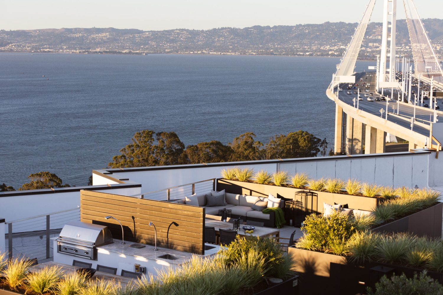 Sunset view of bridge to The Bristol Luxury Condominium Residences Yerba Buena Island San Francisco For Sale